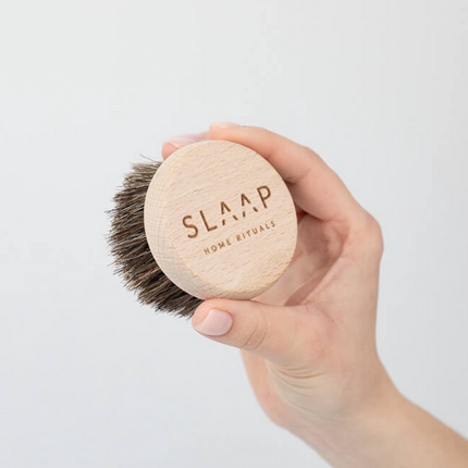 A brush for massaging the bust, neck and décolleté